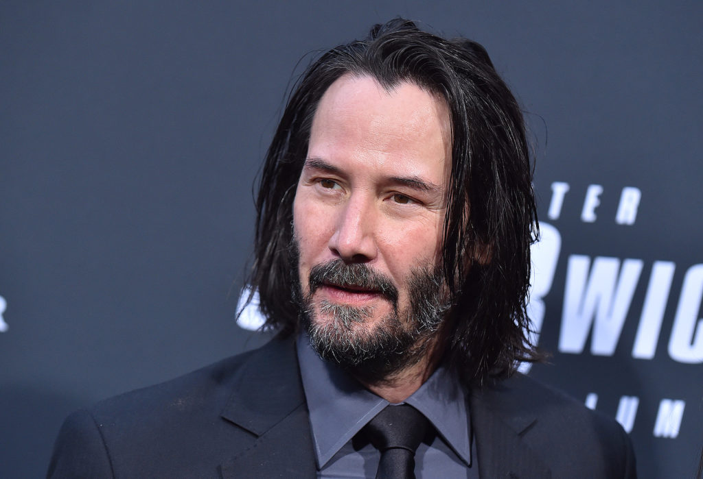 Keanu Reeves' long hair has become a part of his identity.