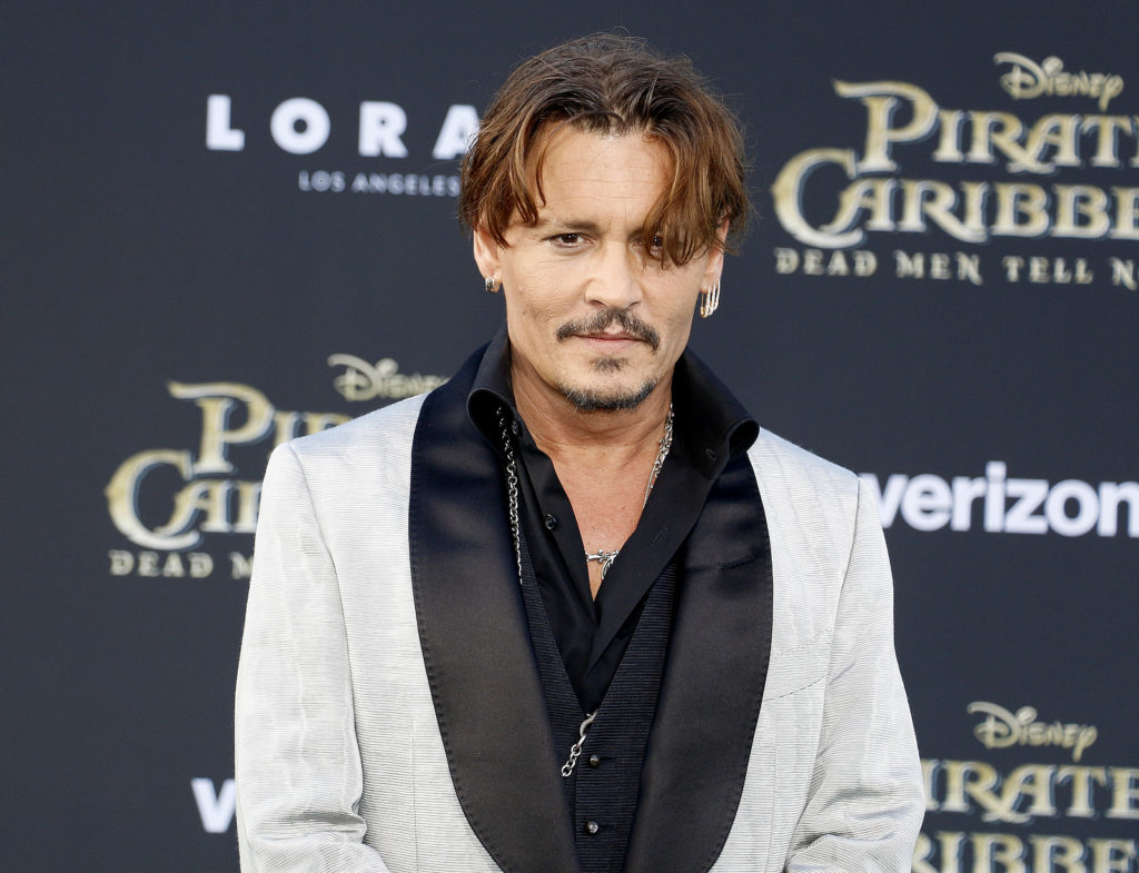 Johnny Depp's long hair style look is iconic.
